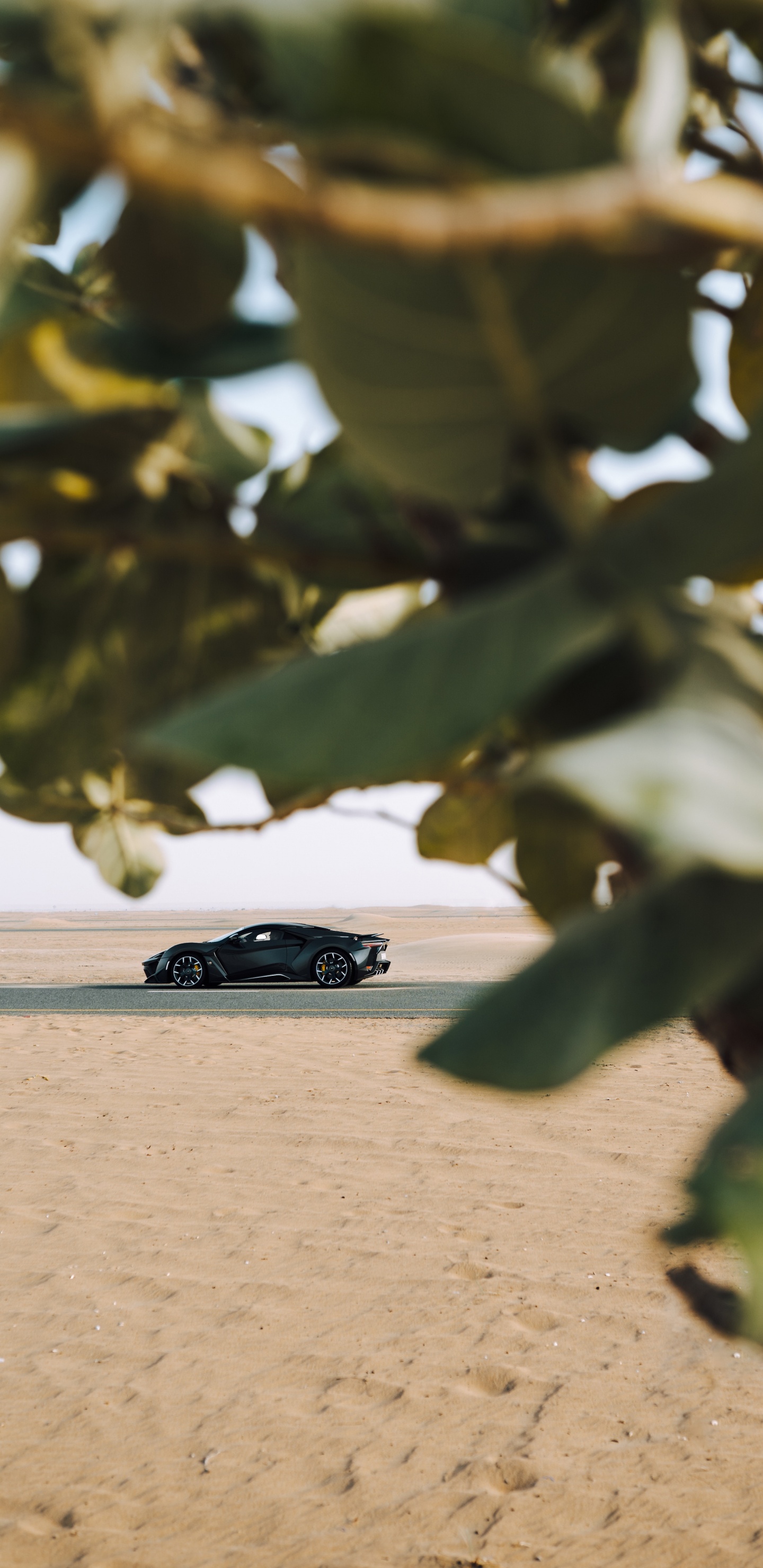 Black Coupe on Brown Sand During Daytime. Wallpaper in 1440x2960 Resolution