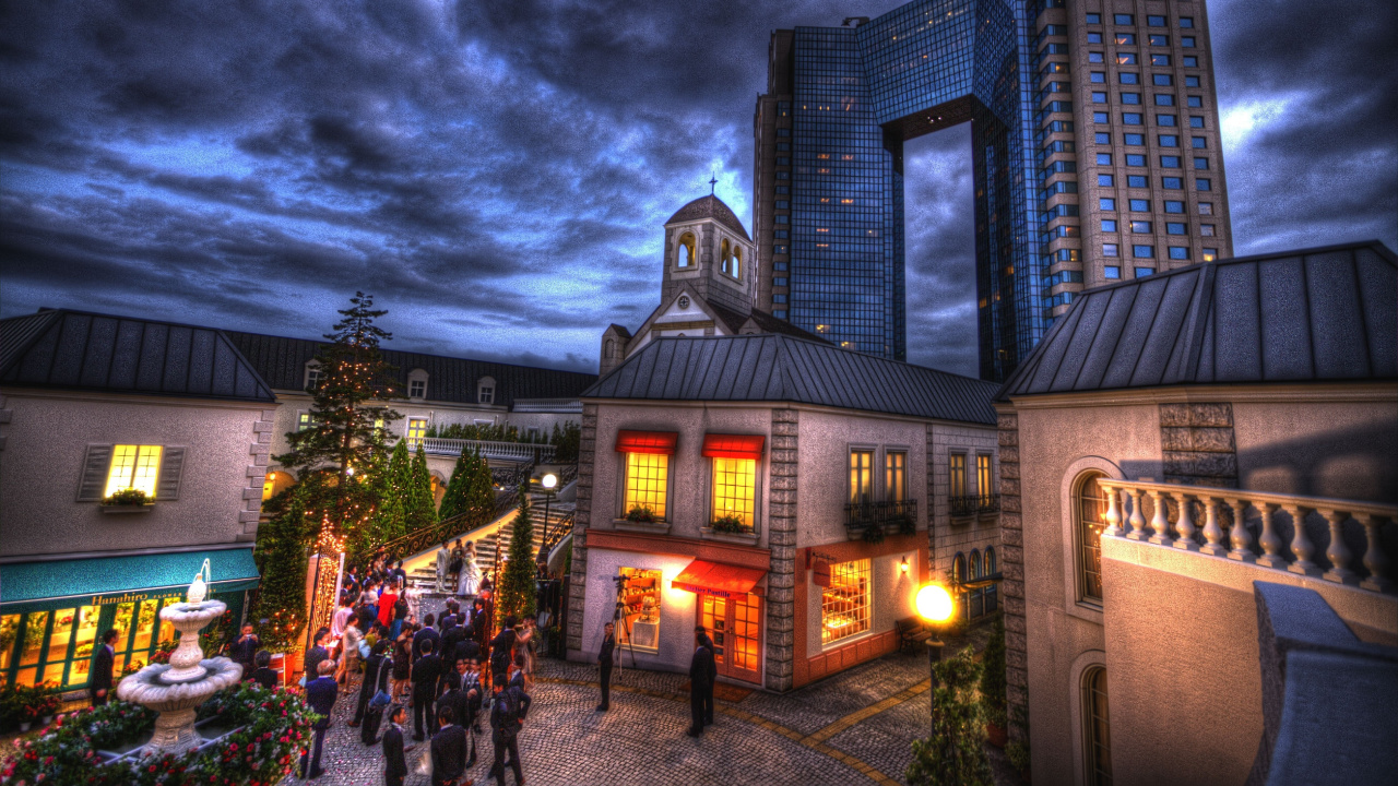 People Walking on Street Near Building During Night Time. Wallpaper in 1280x720 Resolution