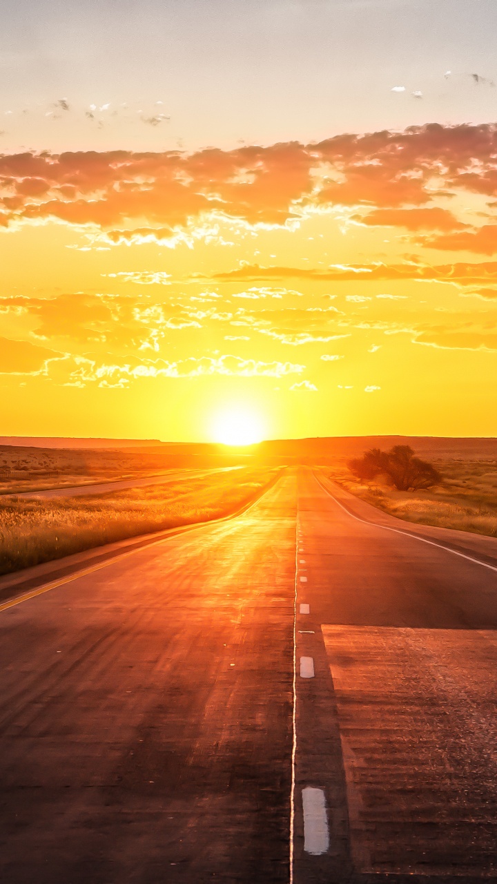 Gray Concrete Road During Sunset. Wallpaper in 720x1280 Resolution