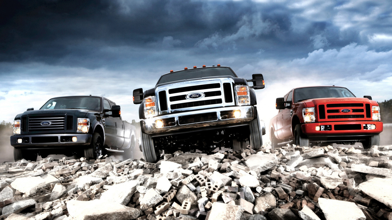 Black Chevrolet Truck on Rocky Ground Under Gray Cloudy Sky During Daytime. Wallpaper in 1366x768 Resolution