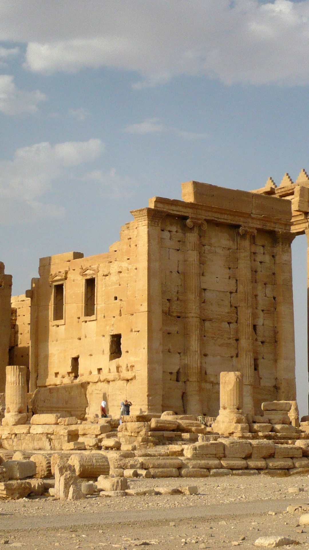 Brown Concrete Building Under Blue Sky During Daytime. Wallpaper in 1080x1920 Resolution