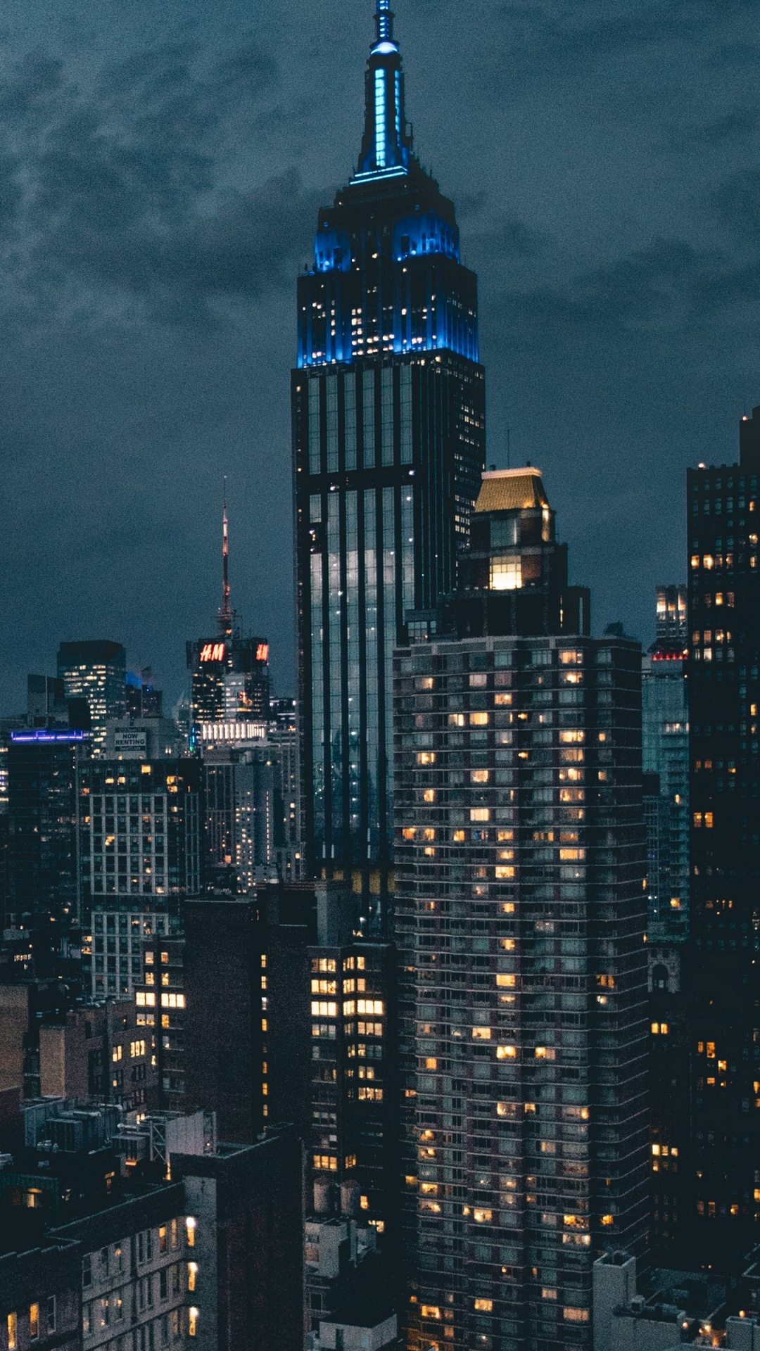 High Rise Buildings Under Gray Clouds. Wallpaper in 1080x1920 Resolution