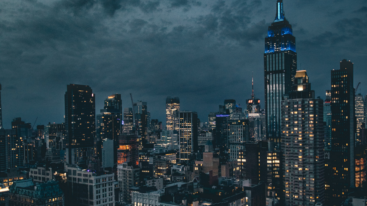 High Rise Buildings Under Gray Clouds. Wallpaper in 1280x720 Resolution