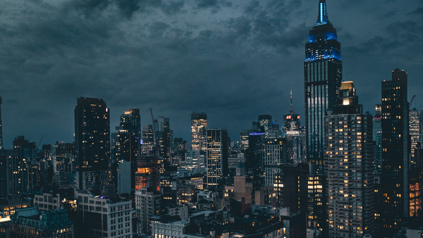 High Rise Buildings Under Gray Clouds. Wallpaper in 1366x768 Resolution