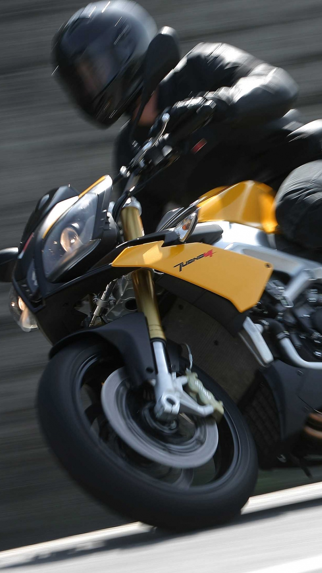 Man in Black Jacket Riding Yellow Sports Bike. Wallpaper in 1080x1920 Resolution