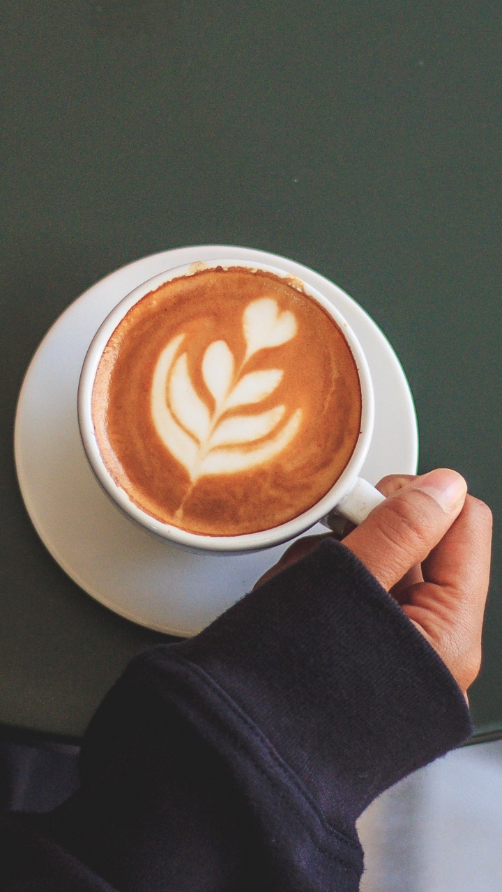 Person Holding White Ceramic Mug With Brown Liquid. Wallpaper in 720x1280 Resolution