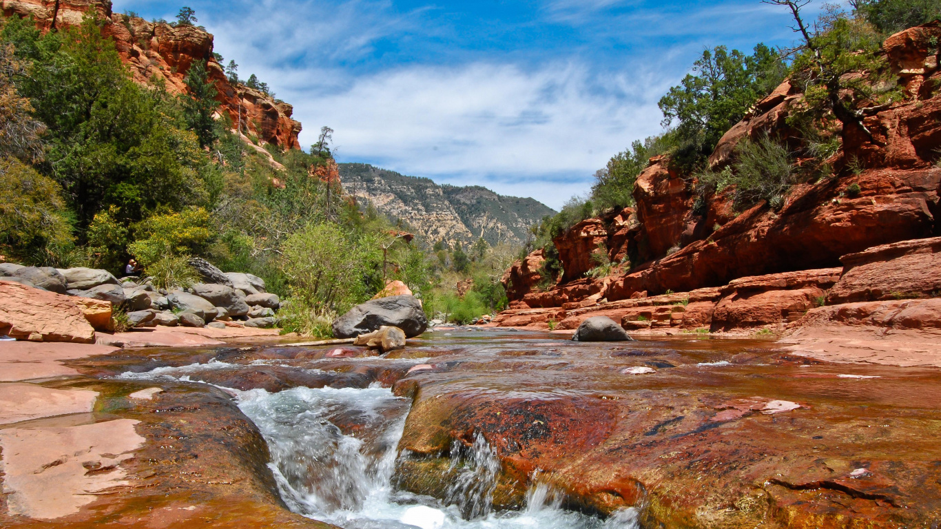 River in Between Brown and Green Mountains Under Blue Sky During Daytime. Wallpaper in 1366x768 Resolution