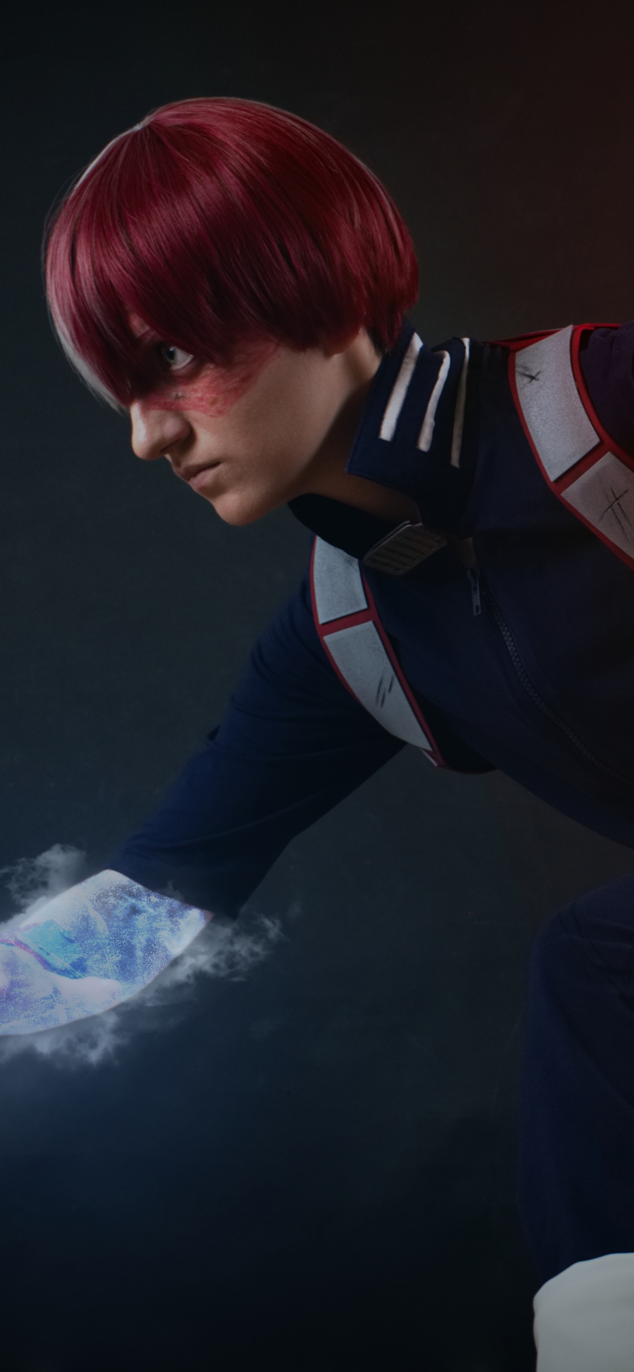 Homme en Veste Noire Tenant le Feu. Wallpaper in 1242x2688 Resolution