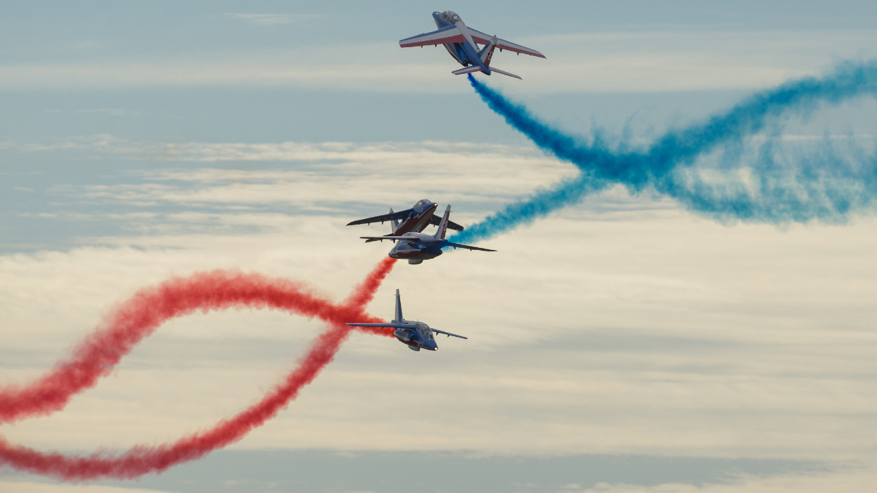 Blue and Red Jet Plane in Flight. Wallpaper in 1280x720 Resolution