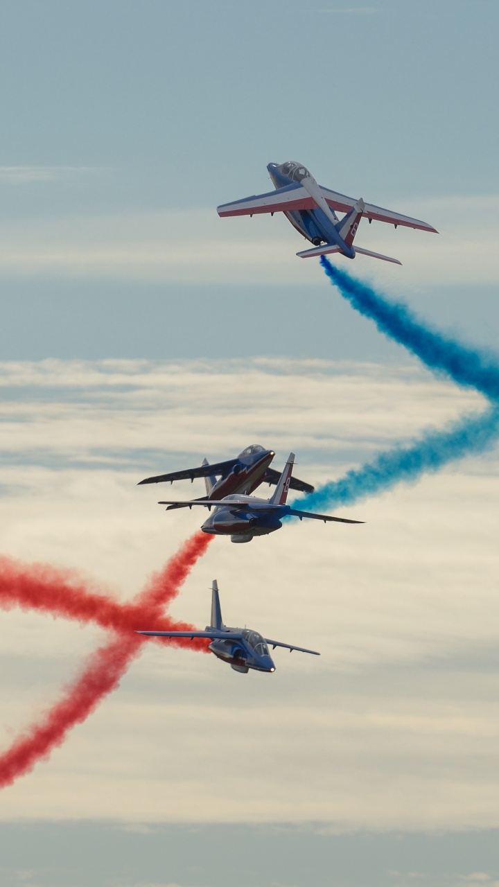 Blue and Red Jet Plane in Flight. Wallpaper in 720x1280 Resolution