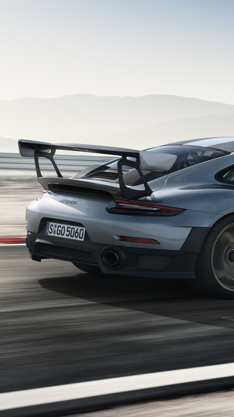 Gray Porsche 911 on Gray Asphalt Road During Daytime. Wallpaper in 750x1334 Resolution