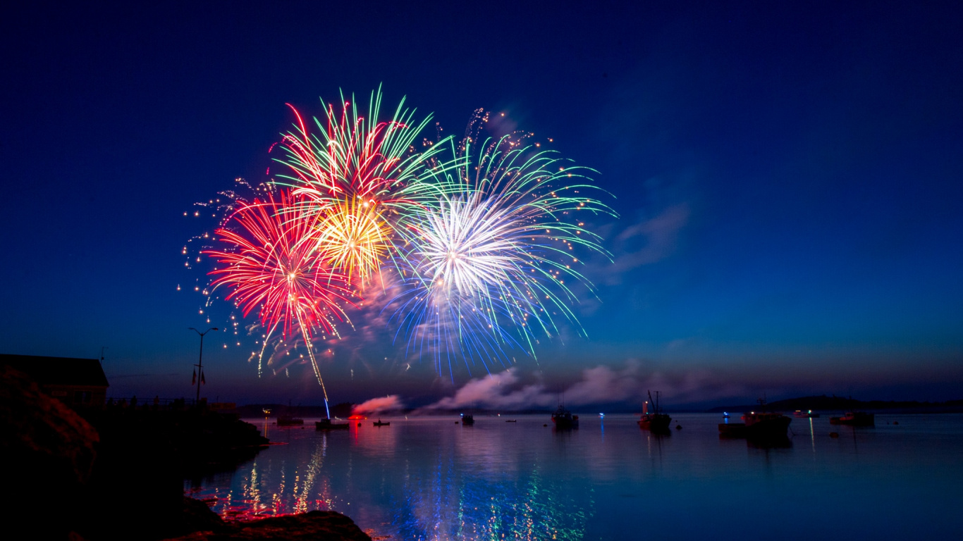 Download 1366x768 Wallpaper Fireworks, New Years Eve, Independence Day, Reflection, Event Fireworks, New Years Eve, Independence Day, Reflection, Event. Wallpaper in 1366x768 Resolution