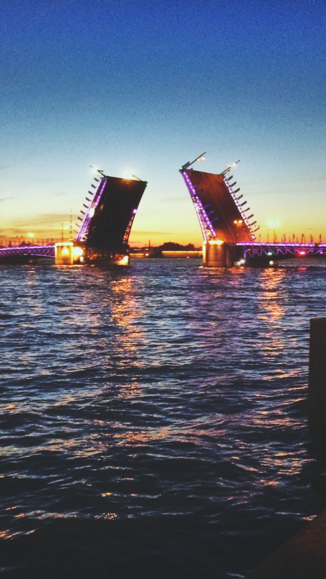Brown Wooden Dock on Body of Water During Night Time. Wallpaper in 1080x1920 Resolution