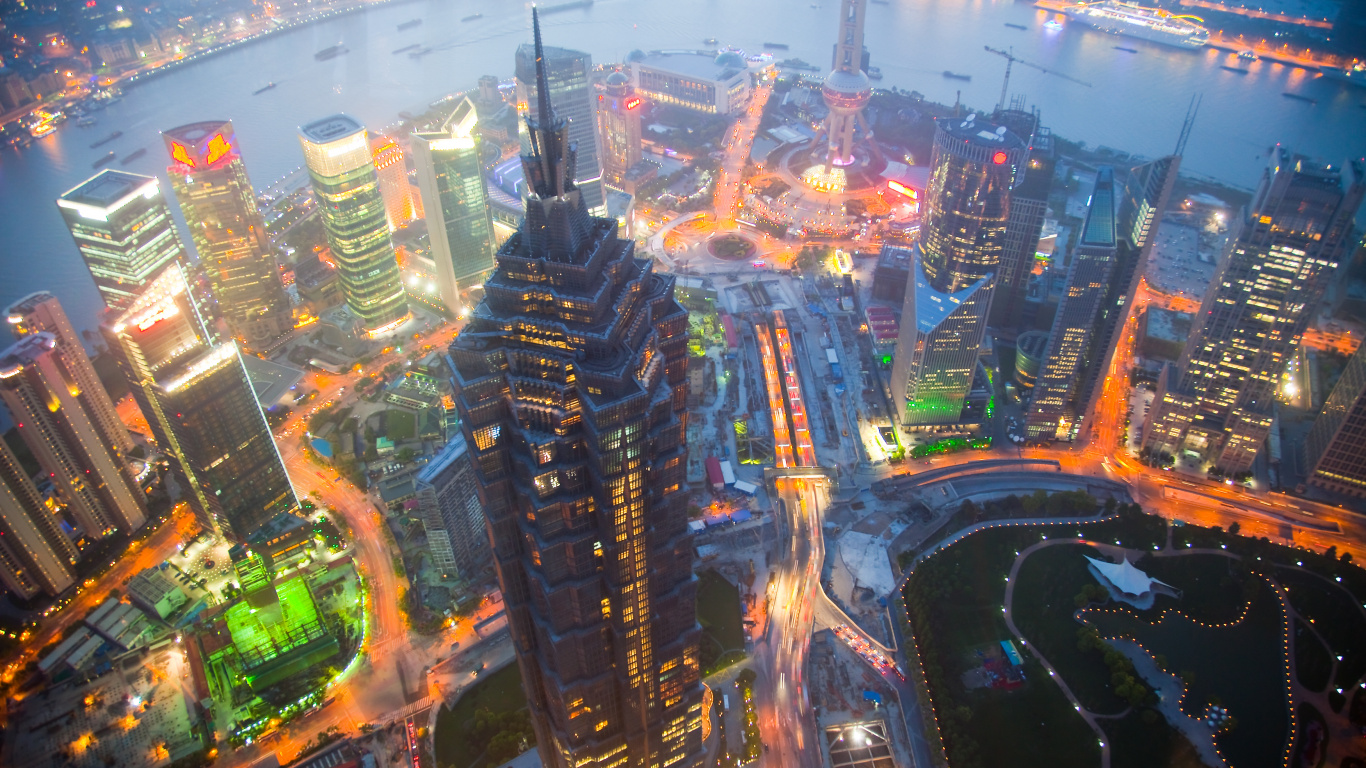 Aerial View of City Buildings During Night Time. Wallpaper in 1366x768 Resolution