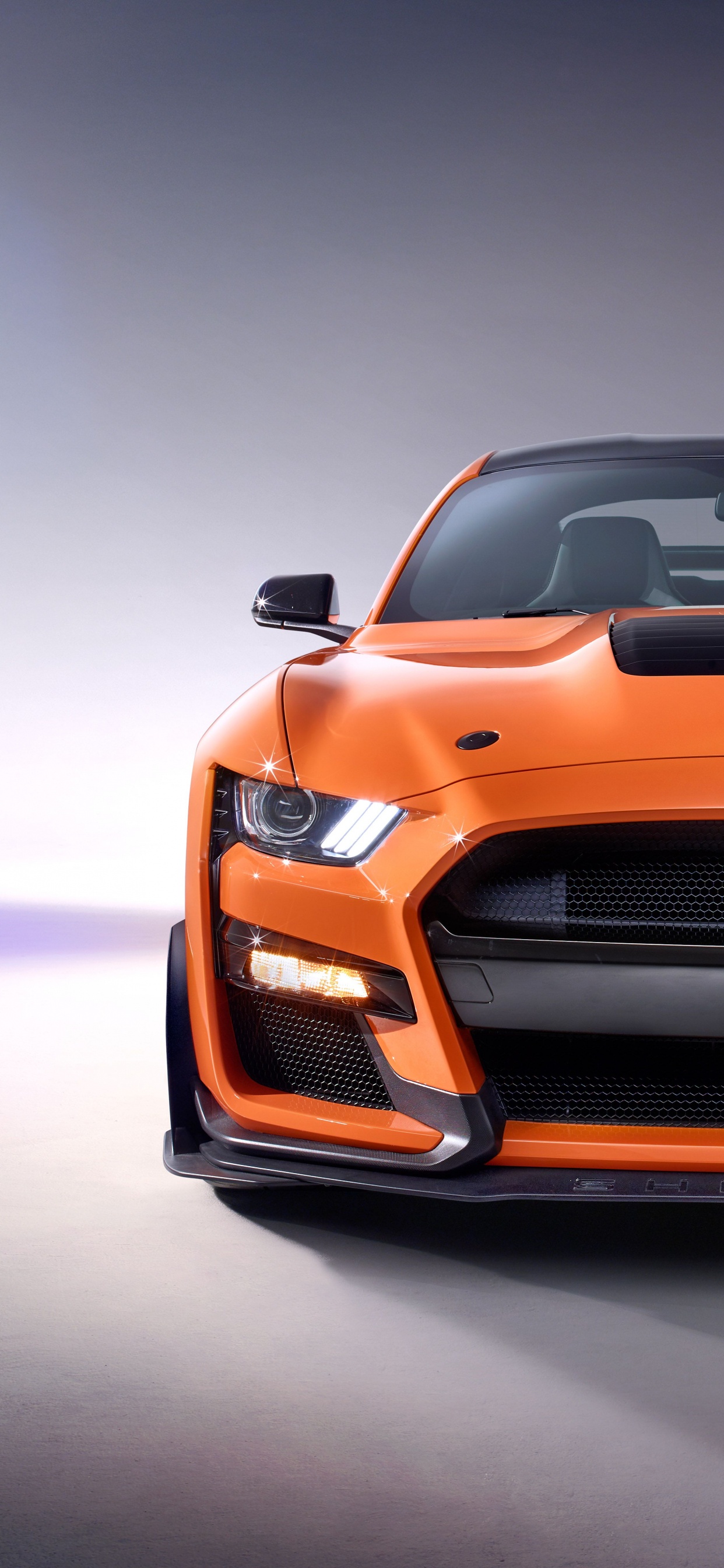 Orange Bmw m3 Coupé. Wallpaper in 1242x2688 Resolution