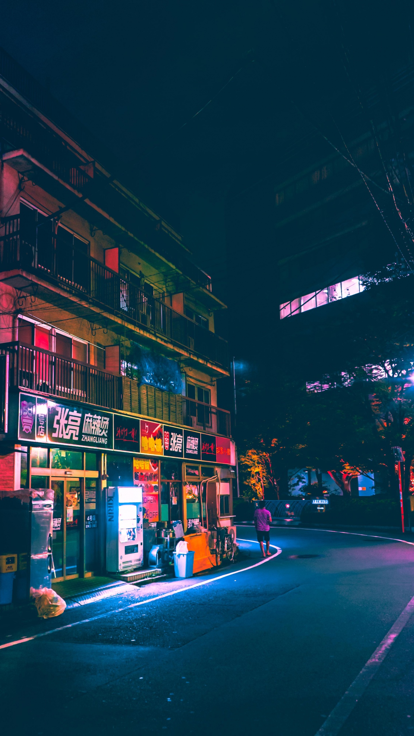 Cars Parked in Front of Store During Night Time. Wallpaper in 1440x2560 Resolution