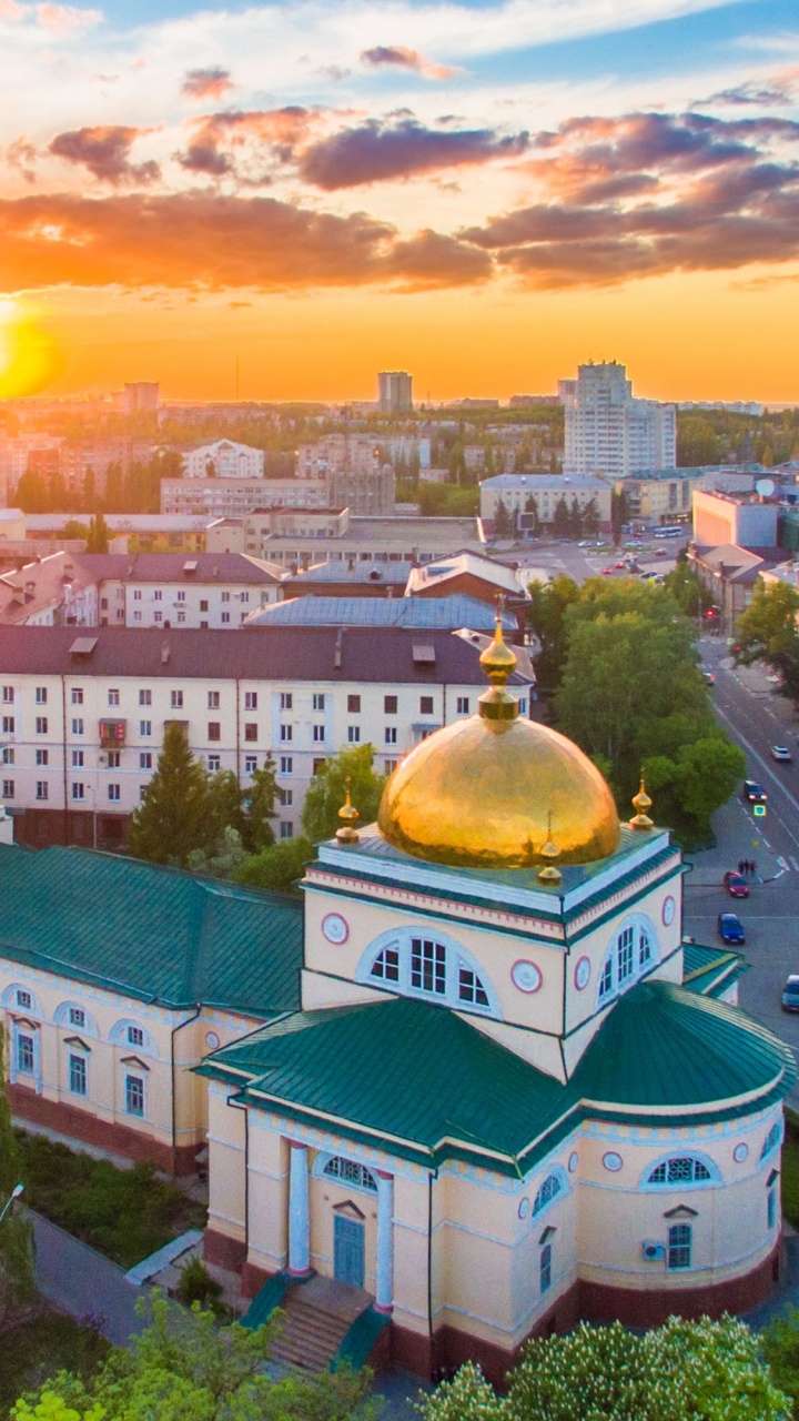 Edificio de Hormigón Blanco y Azul Durante la Puesta de Sol. Wallpaper in 720x1280 Resolution