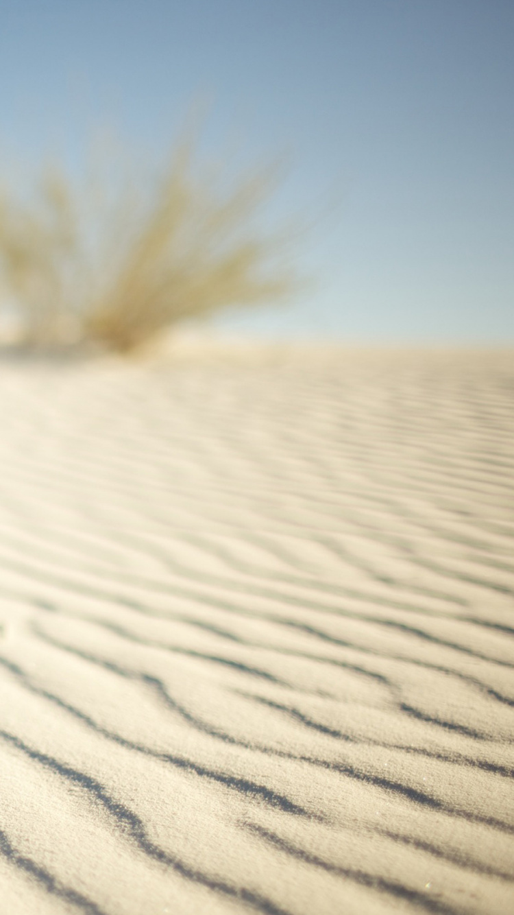 White Sand Under Blue Sky During Daytime. Wallpaper in 750x1334 Resolution