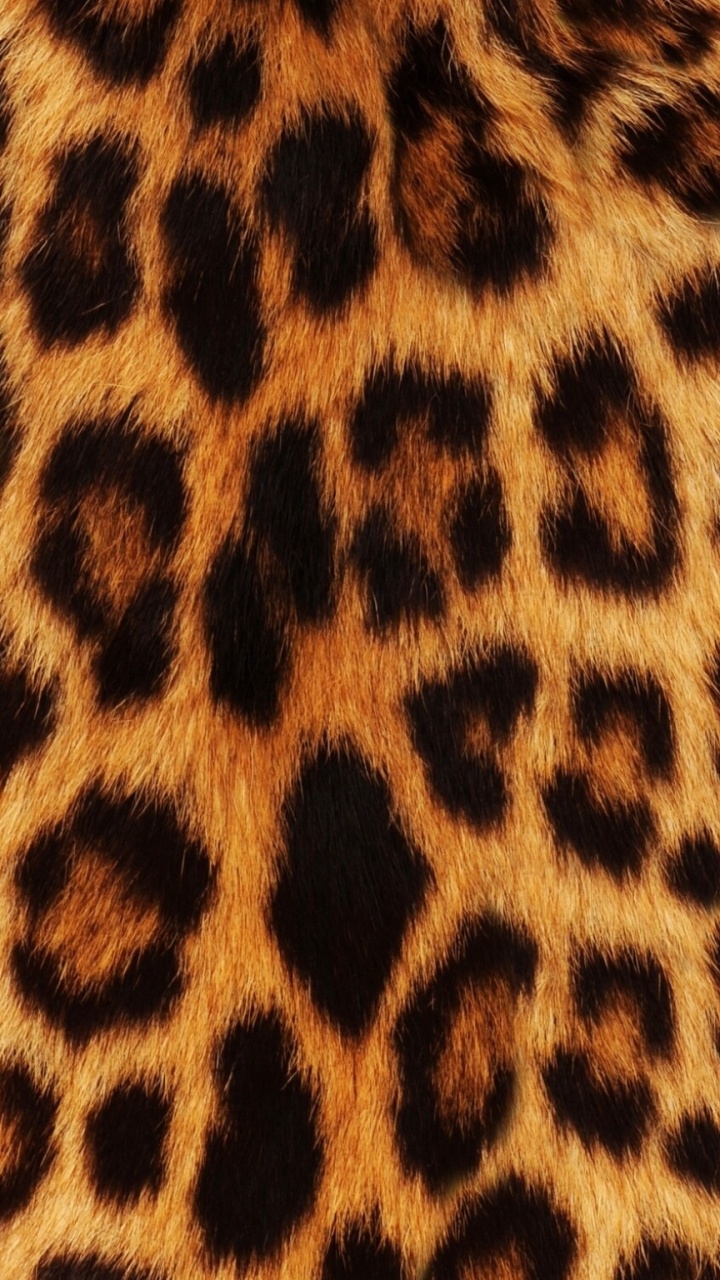Braunes Und Schwarzes Leoparden-Textil. Wallpaper in 720x1280 Resolution