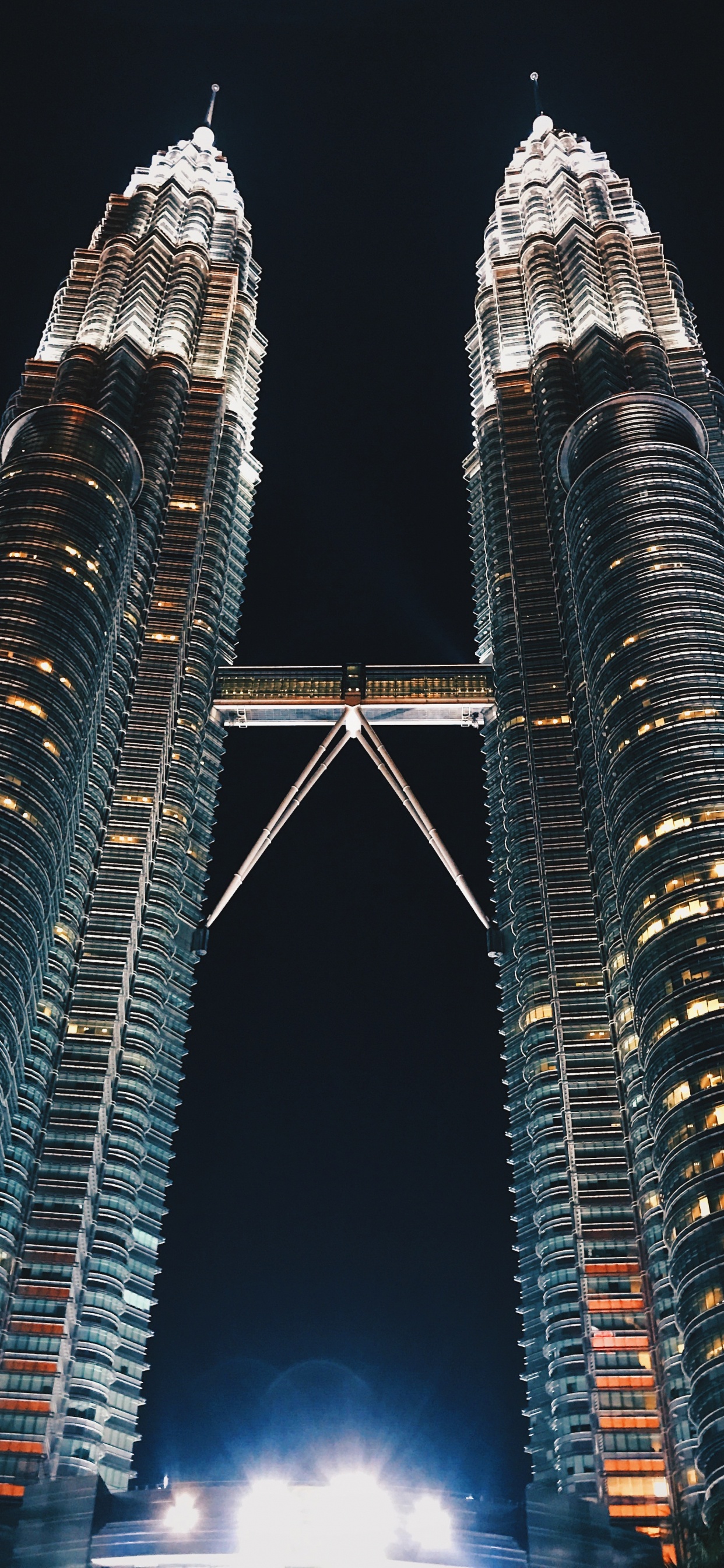 Low Angle Photography of High Rise Building During Night Time. Wallpaper in 1242x2688 Resolution