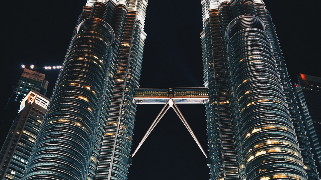 Low Angle Photography of High Rise Building During Night Time. Wallpaper in 1280x720 Resolution