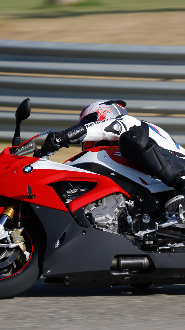 Man in Black and Red Sports Bike Helmet Riding on Red and Black Sports Bike. Wallpaper in 750x1334 Resolution
