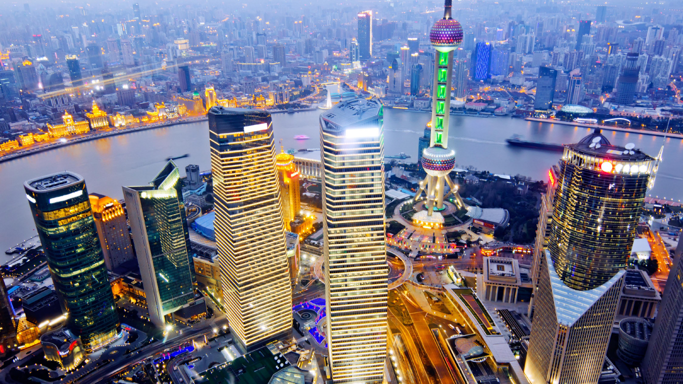 Aerial View of City Buildings During Night Time. Wallpaper in 1366x768 Resolution