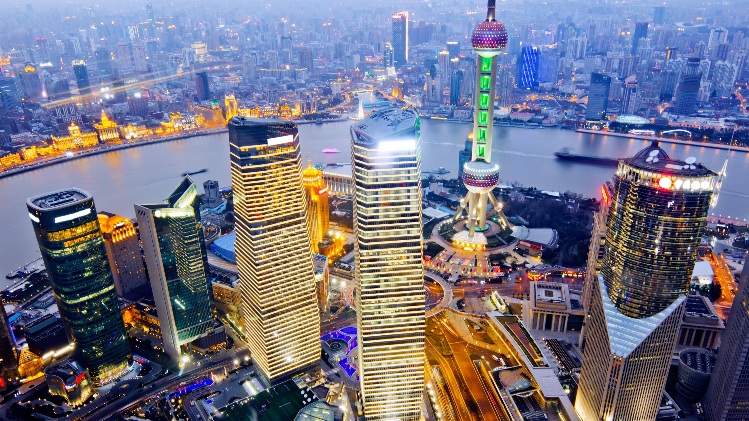 Aerial View of City Buildings During Night Time. Wallpaper in 2560x1440 Resolution