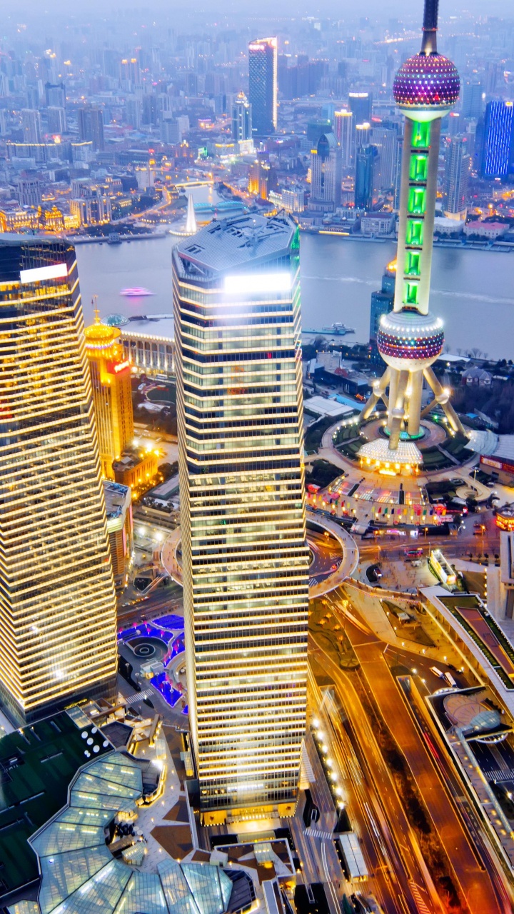 Aerial View of City Buildings During Night Time. Wallpaper in 720x1280 Resolution