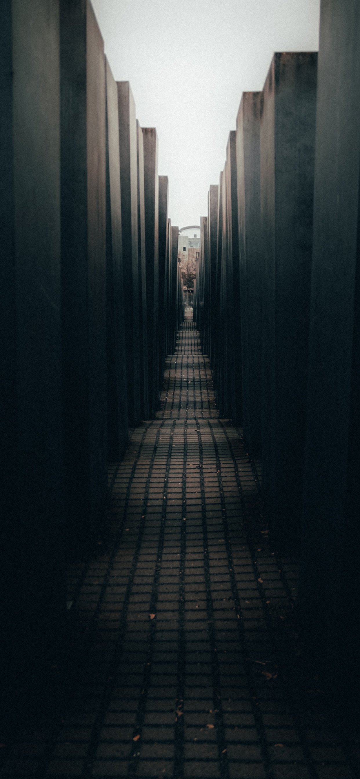 Black and Gray Concrete Building. Wallpaper in 1242x2688 Resolution