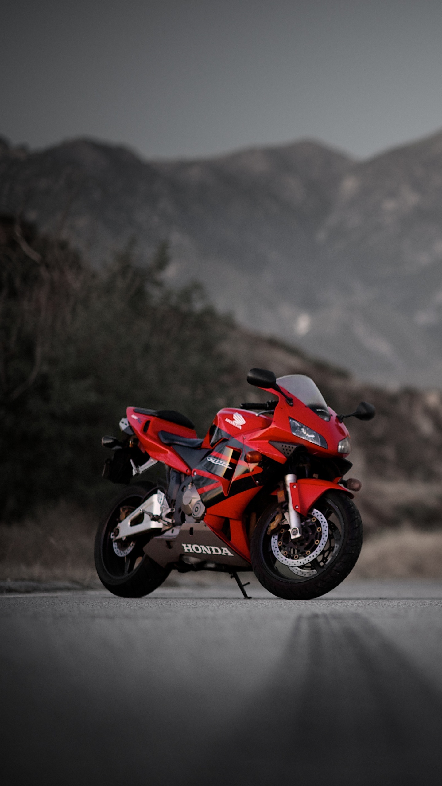 Red and Black Sports Bike on Road During Daytime. Wallpaper in 1440x2560 Resolution