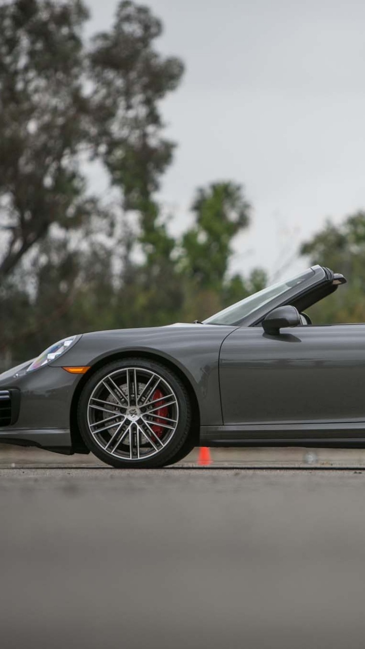 Black Convertible Coupe on Road During Daytime. Wallpaper in 720x1280 Resolution