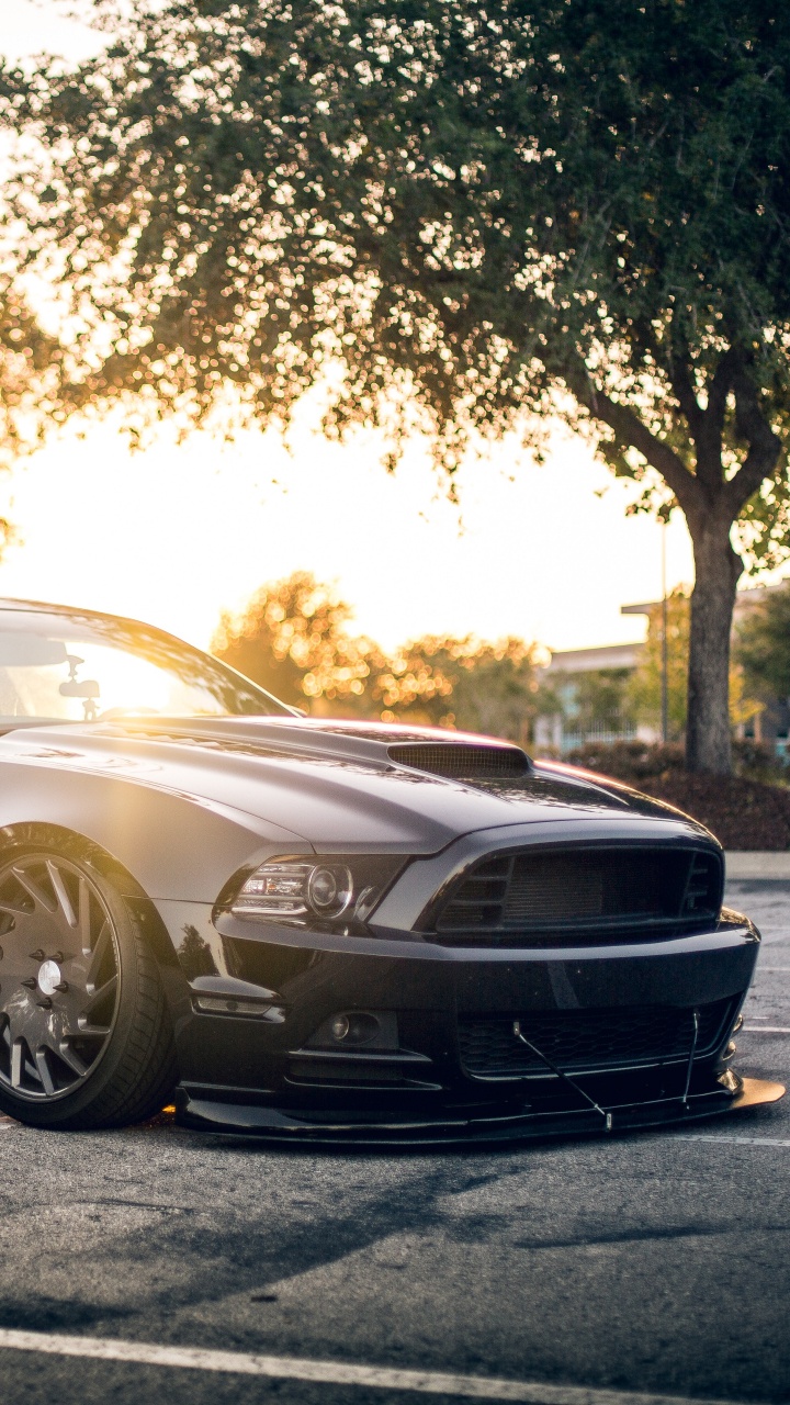 Porsche 911 Noire Sur Route Pendant la Journée. Wallpaper in 720x1280 Resolution