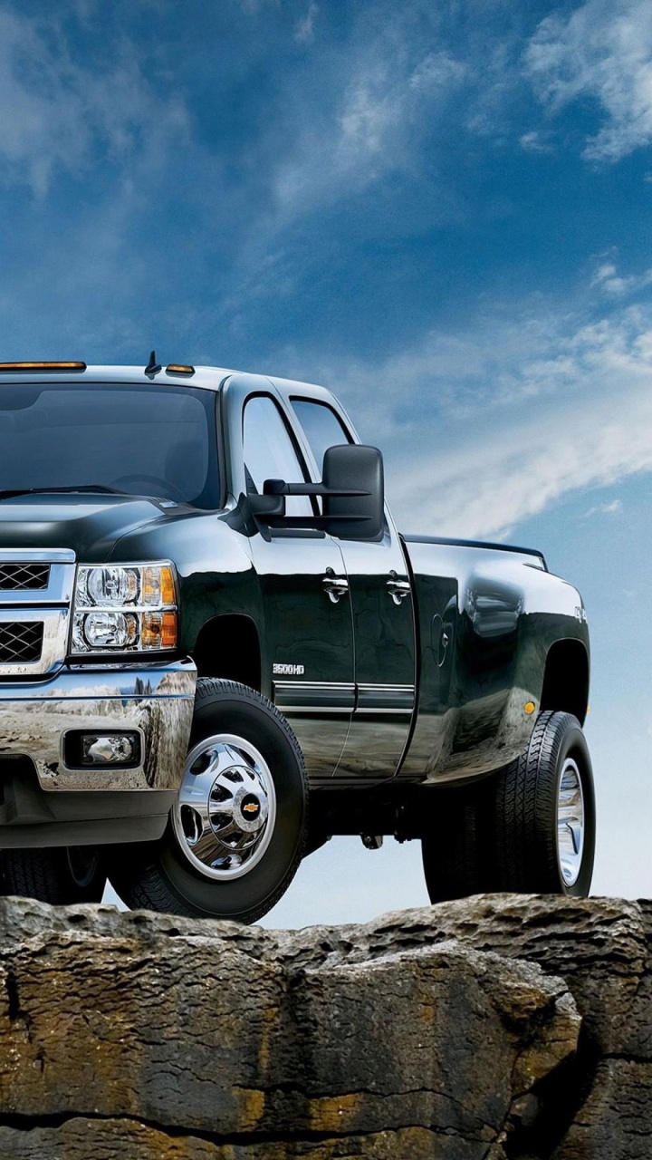 Gray Chevrolet Crew Cab Pickup Truck. Wallpaper in 720x1280 Resolution