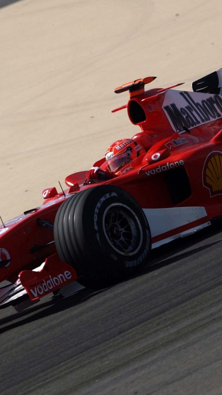 Red and Black f 1 Car on Gray Road. Wallpaper in 720x1280 Resolution