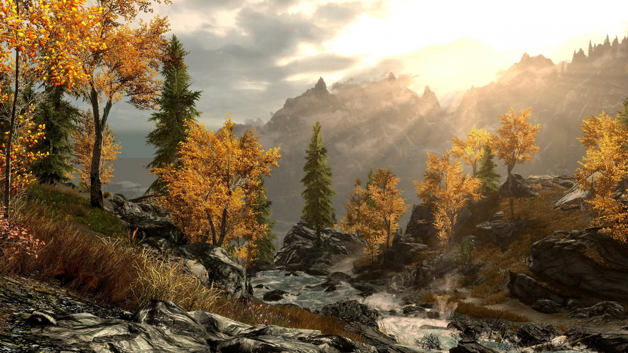 Green and Yellow Trees Near Mountain During Daytime. Wallpaper in 2560x1440 Resolution