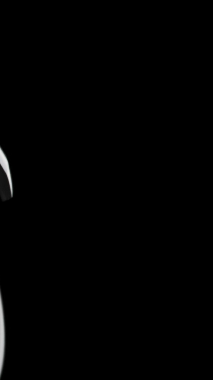 White and Black Headphones on White Surface. Wallpaper in 750x1334 Resolution