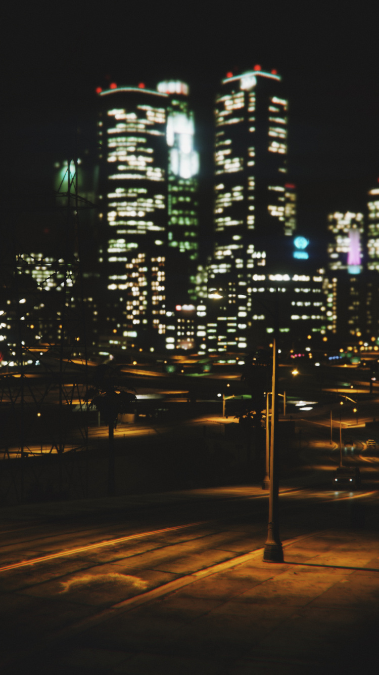 Bâtiments de la Ville Pendant la Nuit. Wallpaper in 750x1334 Resolution