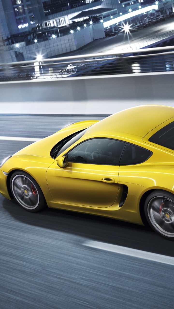 Gelber Porsche 911 Unterwegs. Wallpaper in 720x1280 Resolution