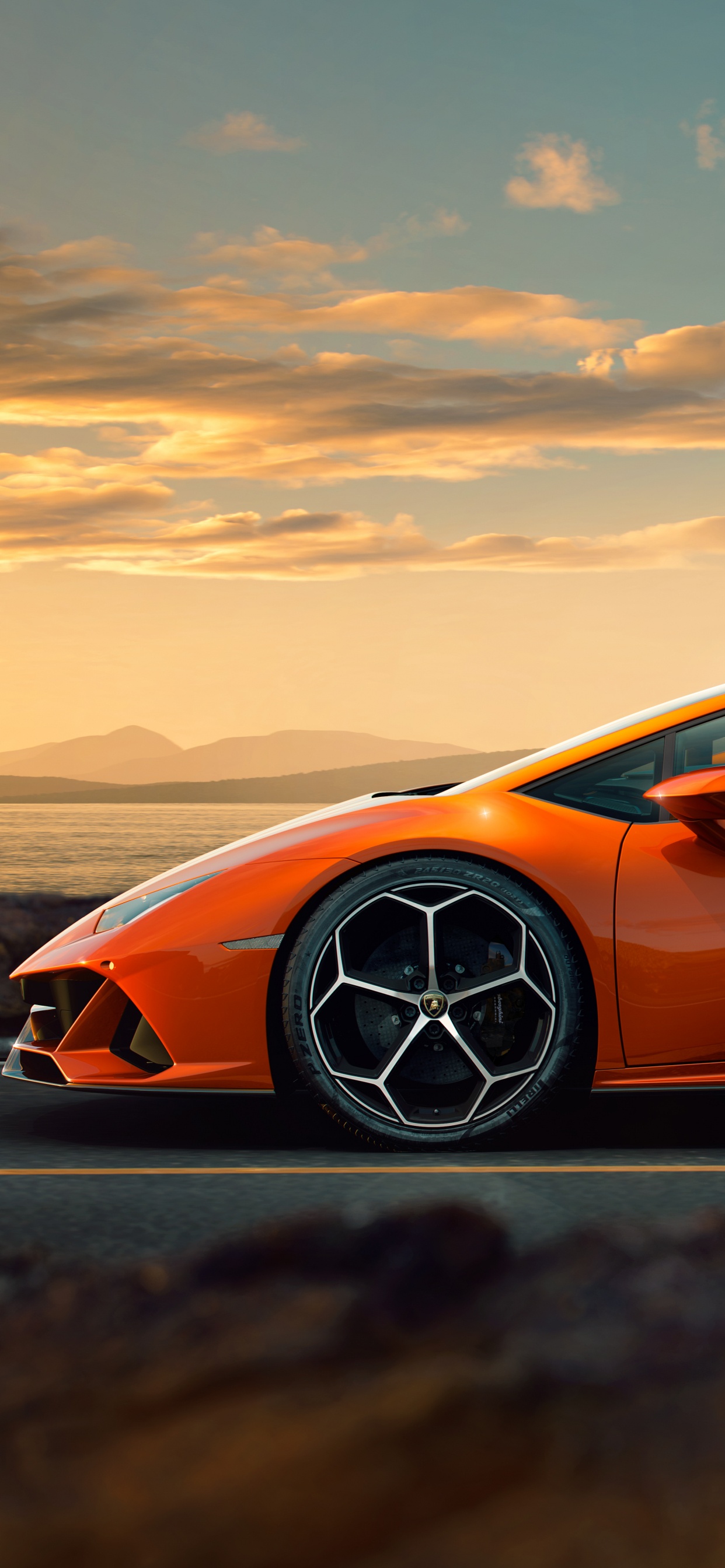 Orange Porsche 911 on Road During Daytime. Wallpaper in 1242x2688 Resolution