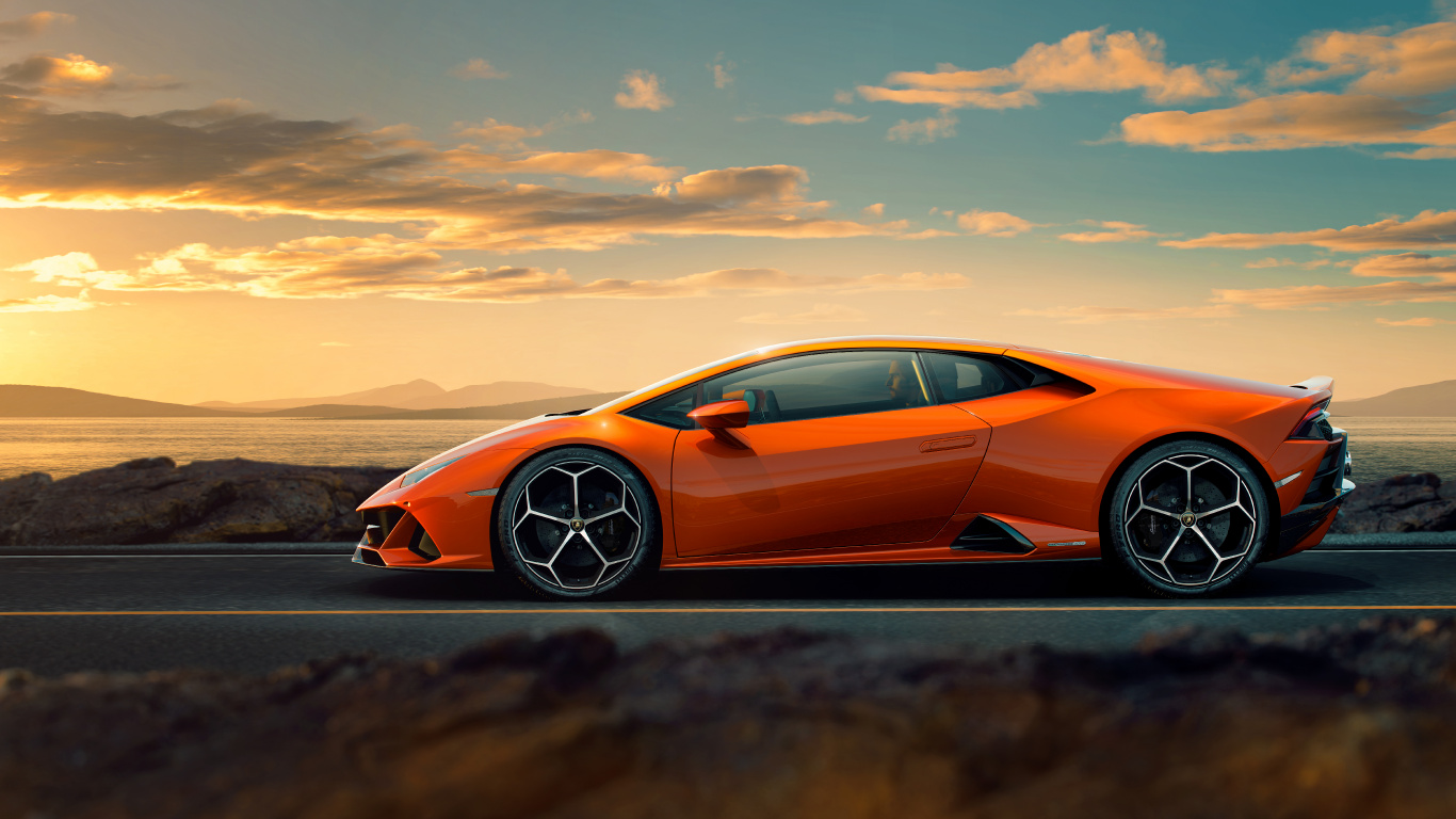 Orange Porsche 911 on Road During Daytime. Wallpaper in 1366x768 Resolution