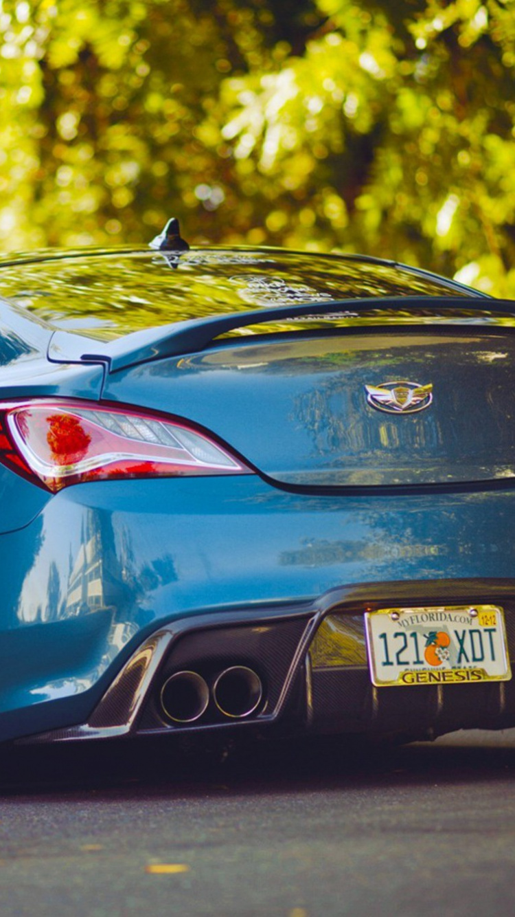 Blue Porsche 911 Parked on Road During Daytime. Wallpaper in 750x1334 Resolution