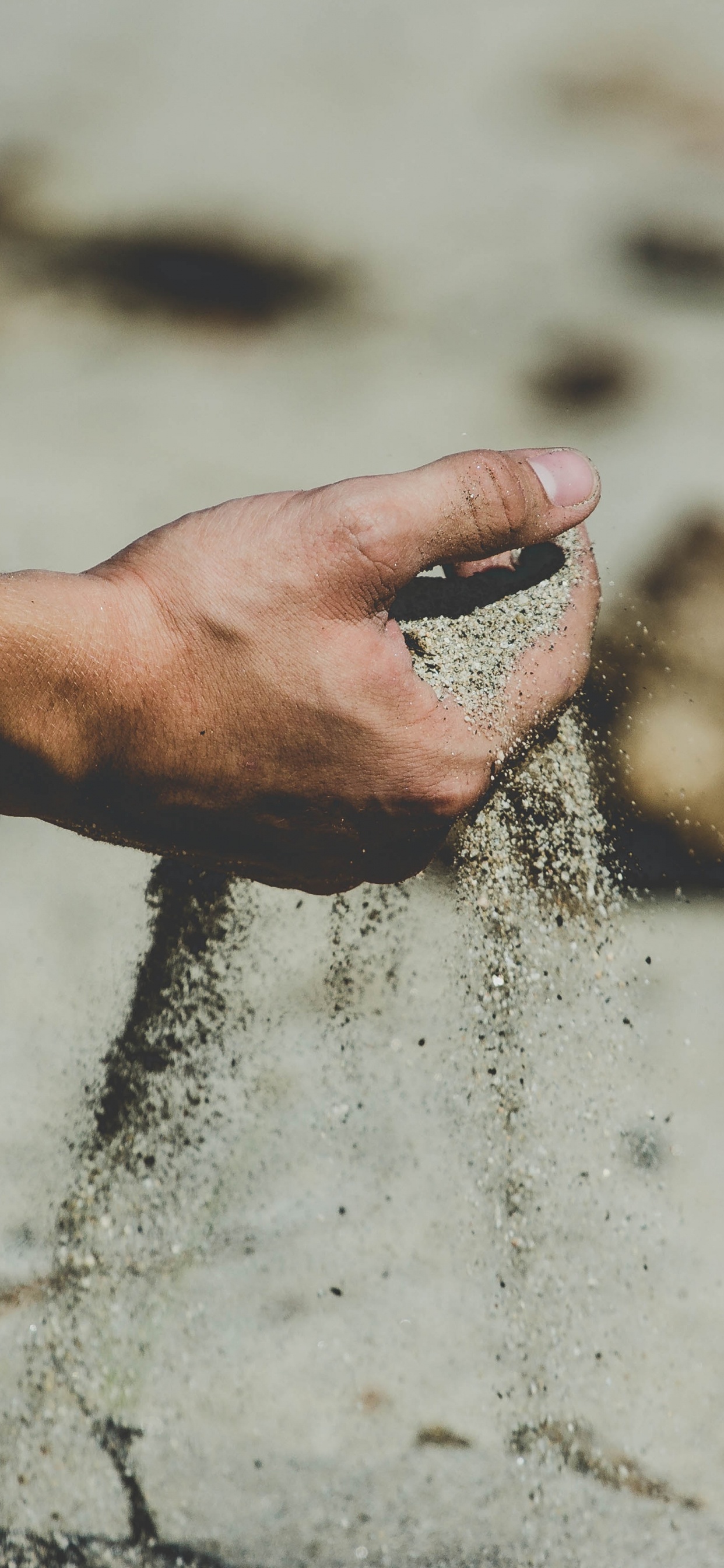 Persons Left Hand on Water. Wallpaper in 1242x2688 Resolution