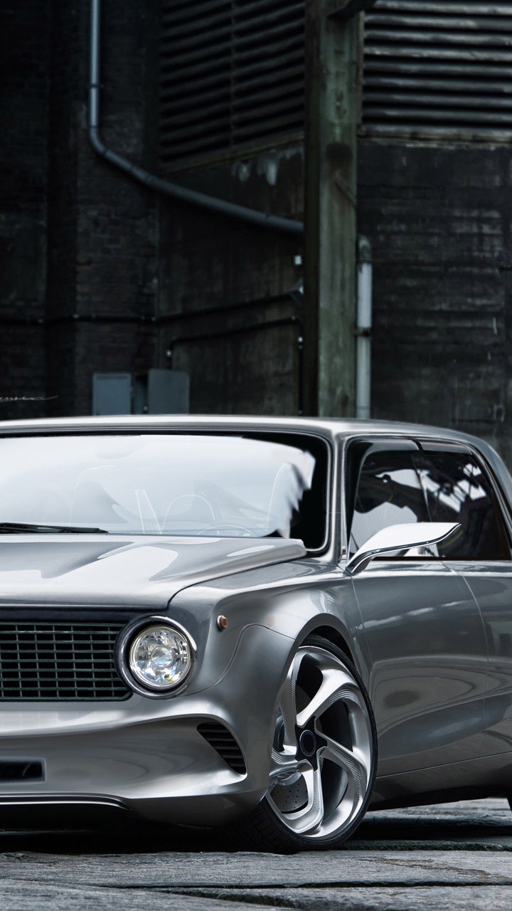 Silver Mercedes Benz Coupe Parked Beside Brown Building. Wallpaper in 720x1280 Resolution