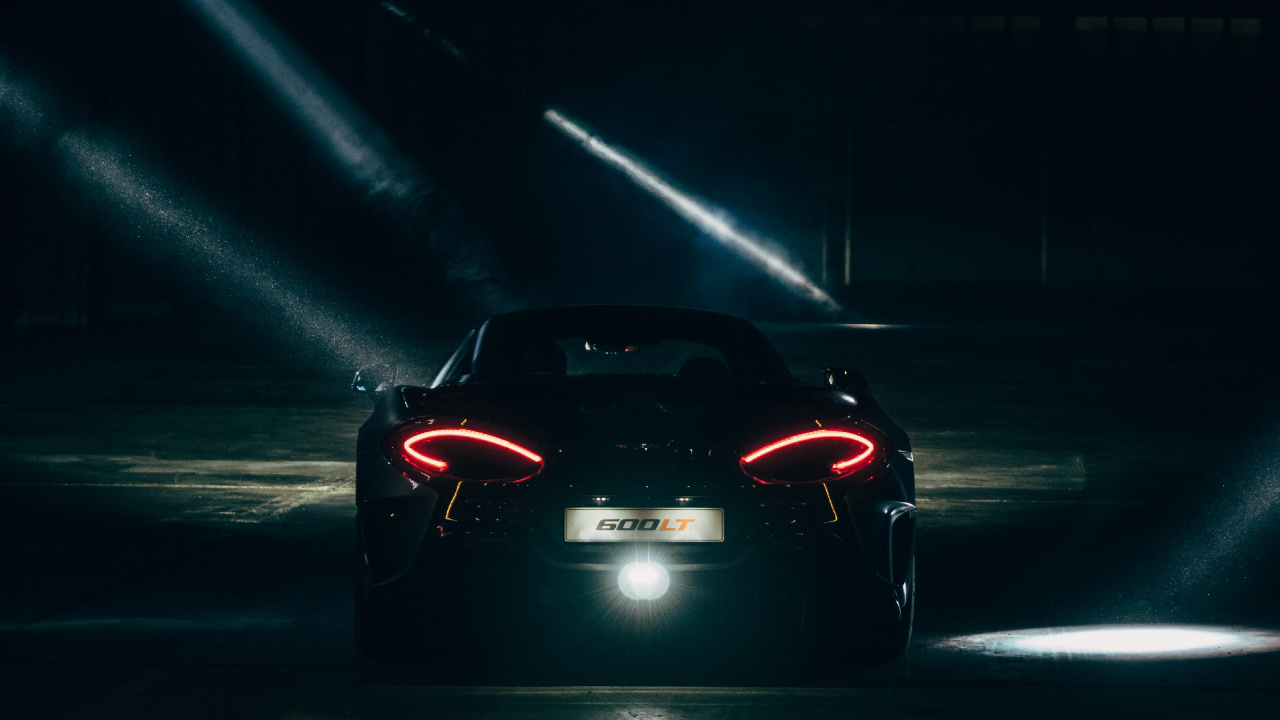 Red Ferrari Sports Car on Road During Nighttime. Wallpaper in 1280x720 Resolution