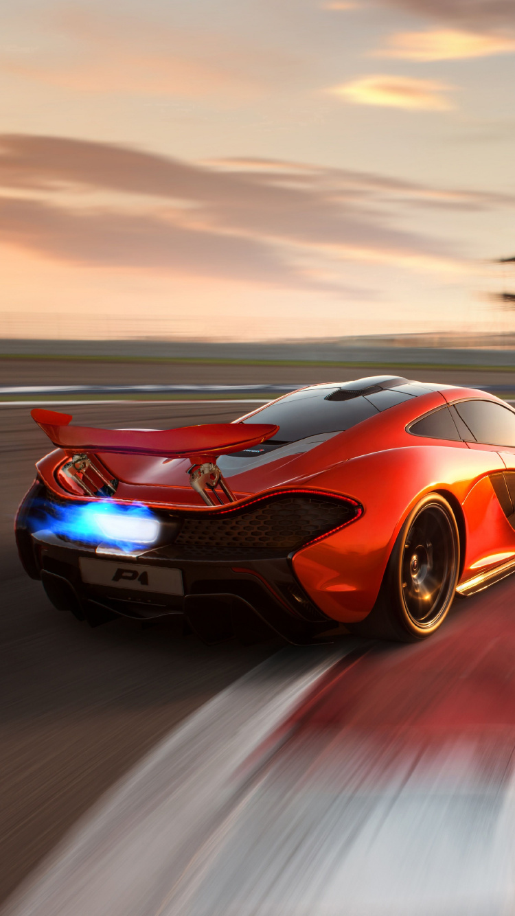 Orange and Black Porsche 911 on Road During Daytime. Wallpaper in 750x1334 Resolution
