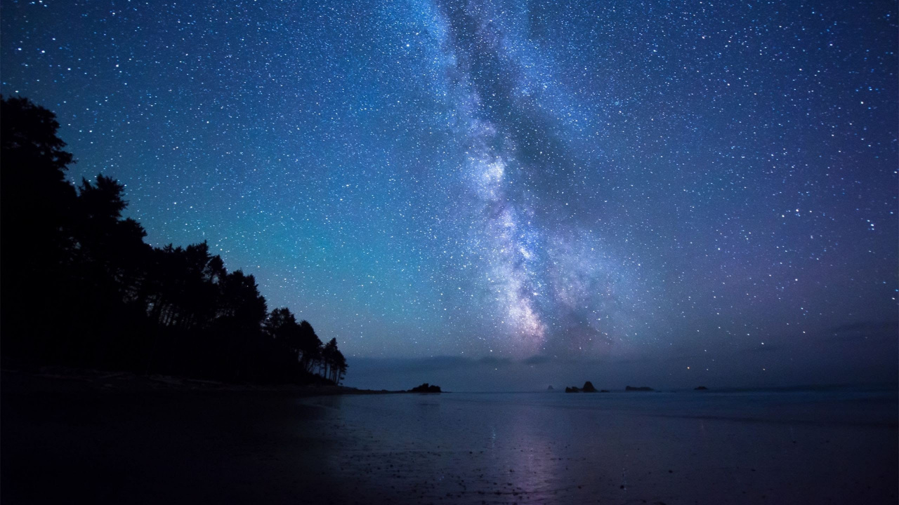 Body of Water Under Starry Night. Wallpaper in 1280x720 Resolution
