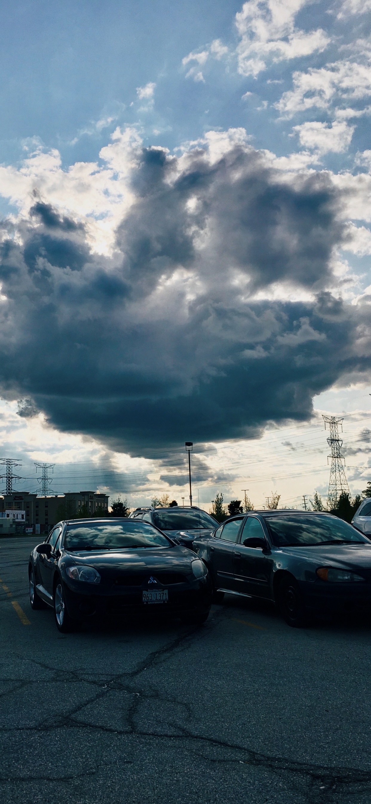 Cars on Road Under Cloudy Sky During Daytime. Wallpaper in 1242x2688 Resolution