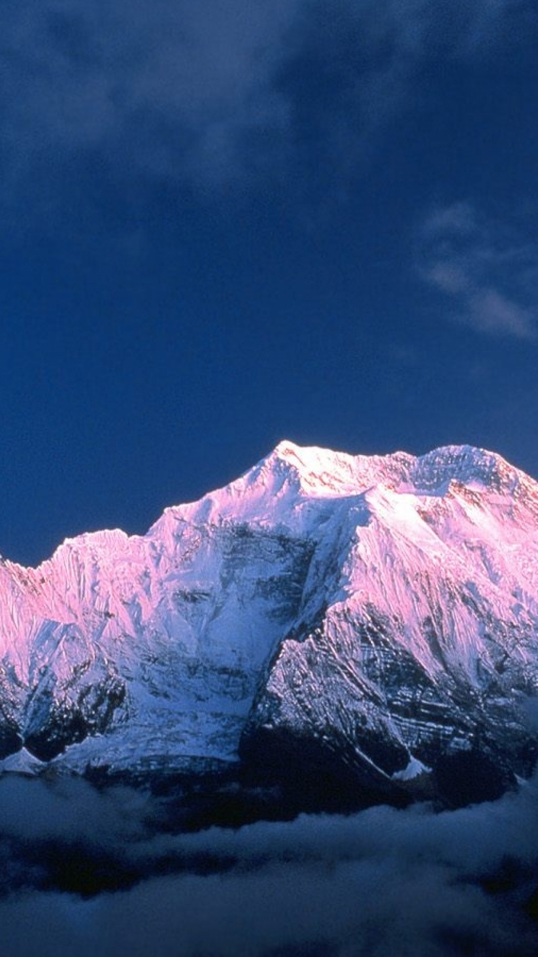 Snow Covered Mountain Under Blue Sky. Wallpaper in 1080x1920 Resolution