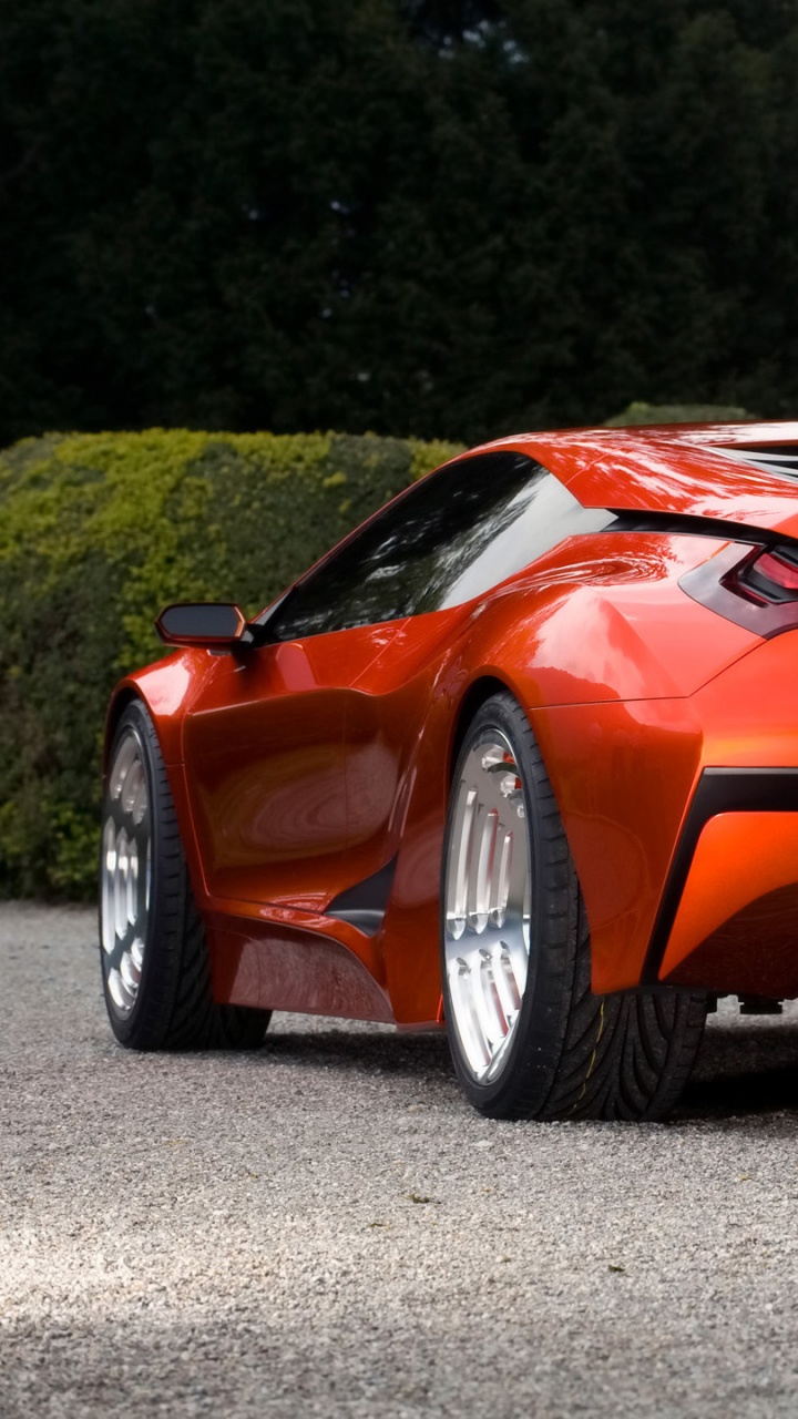 Orange Car on Road During Daytime. Wallpaper in 720x1280 Resolution